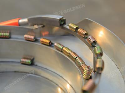 Vibrating disk feed screws